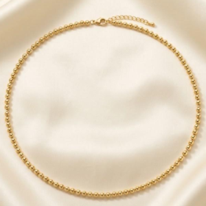 Collar dorado de bolitas
