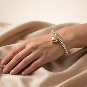 Pulsera bicolor con corazón